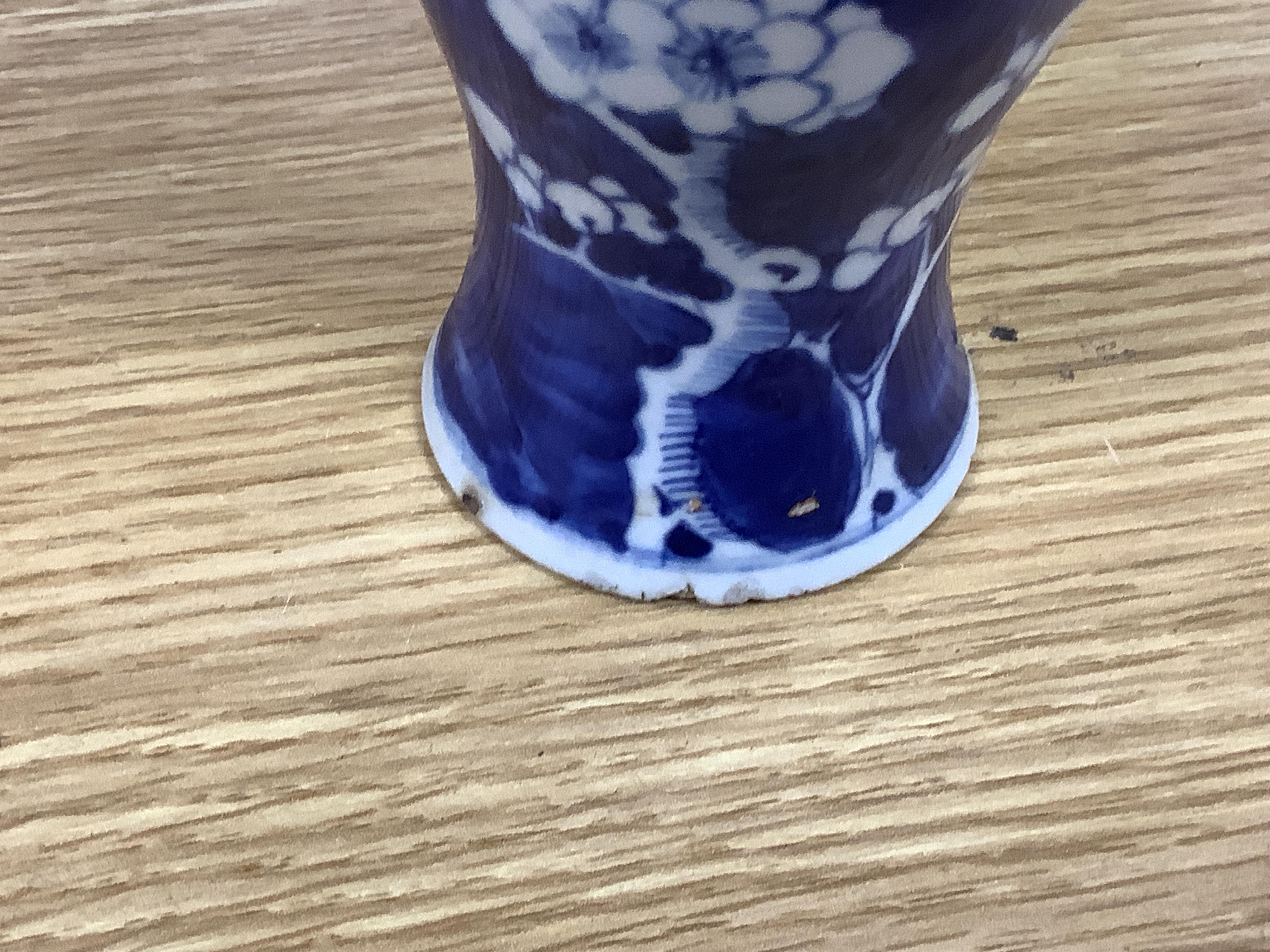 Chinese blue and white porcelain, late 19th century, comprising two prunus vases, two crackle glaze vases and a 'Bird and Flowers' jar, tallest crackle glaze vases 23cm